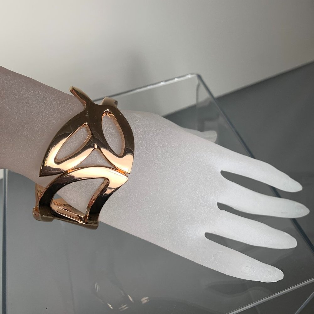 NWOT Rose Gold Tone Cut Out Bangle